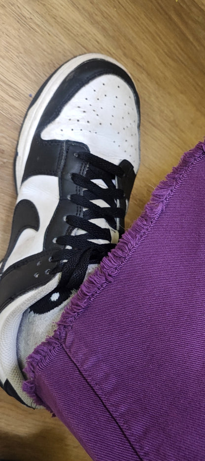 Jeans palazzo viola sfrangiato infondo