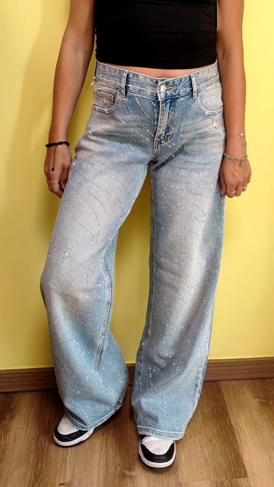 Jeans scie di brillantini