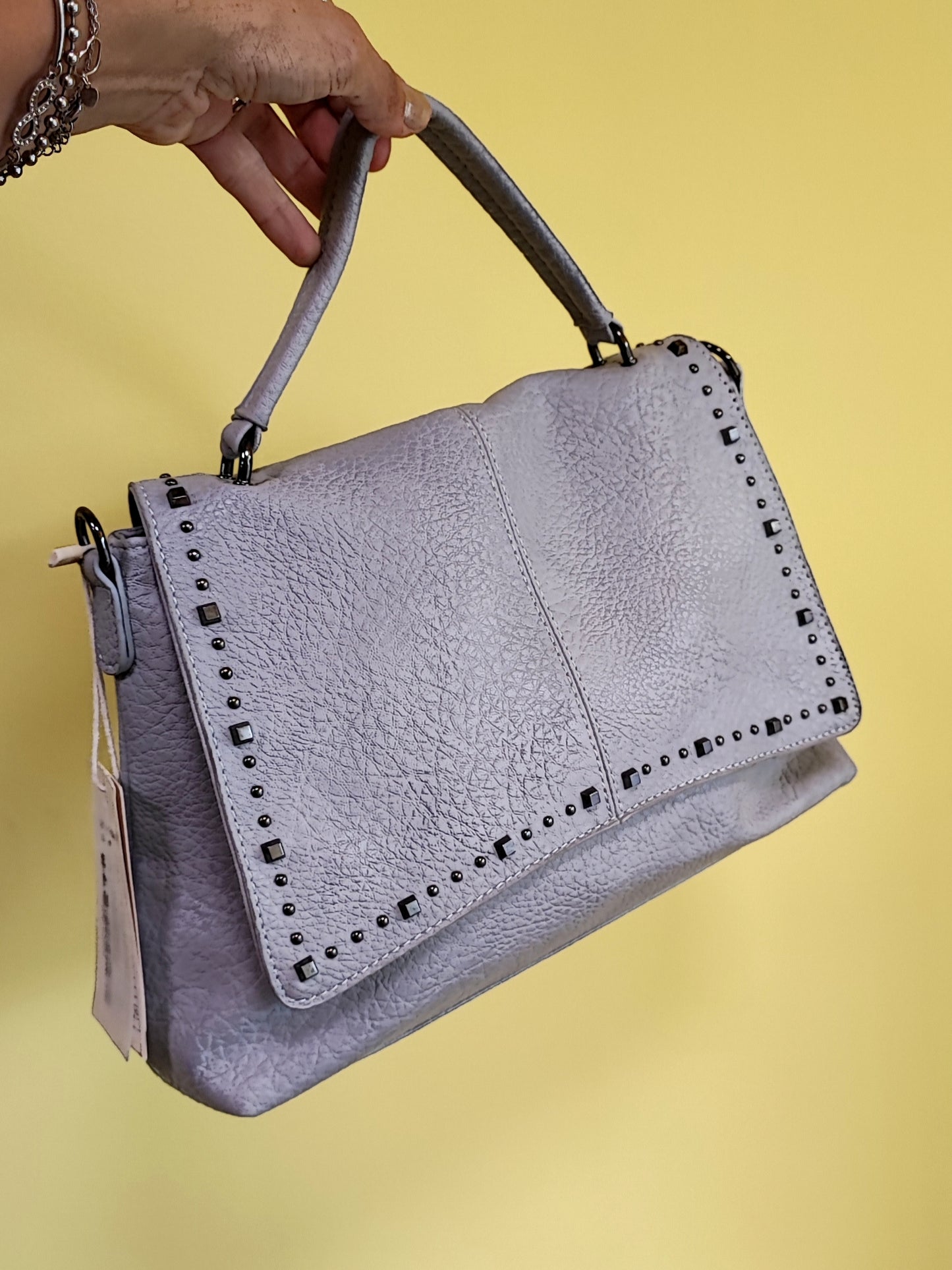 Borsa a cartella grigia con borchie